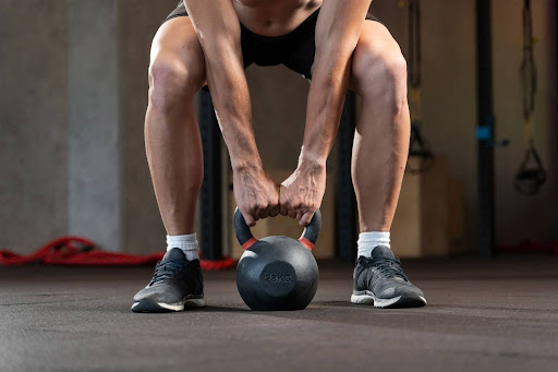 Kettlebell swings engage your hips, glutes, and core